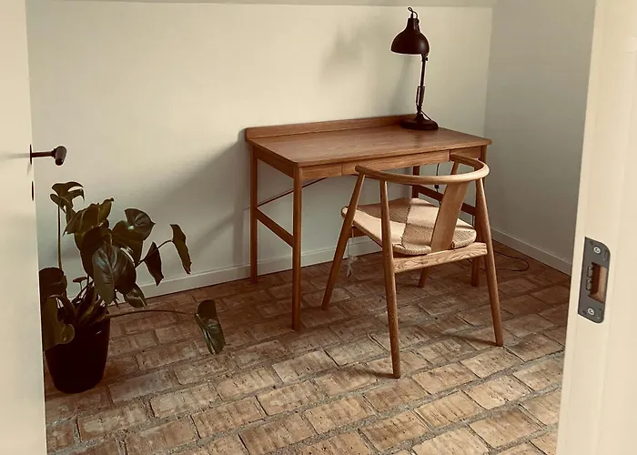 Modernized A-frame House Near Saksild